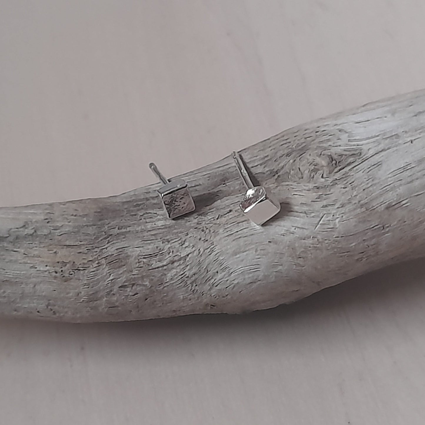 Handmade tiny silver square ear studs.